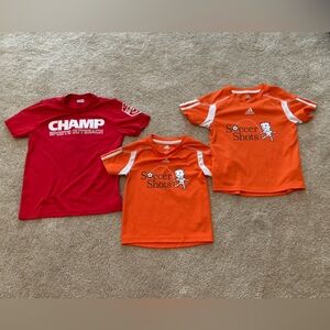 Champ and soccer shots shirts. Soccer shots are adidas and champ is sport-tek